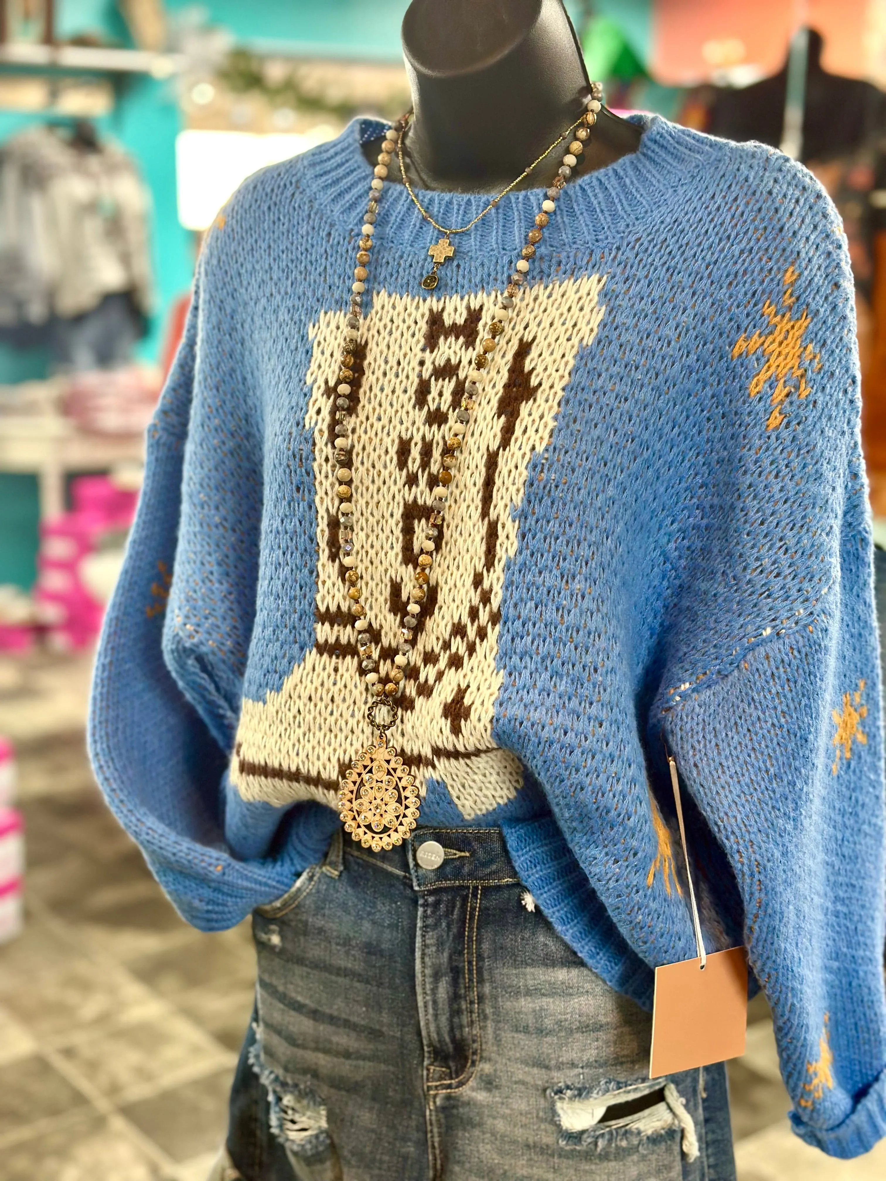 The Kick Your Boots Up Howdy Sweater